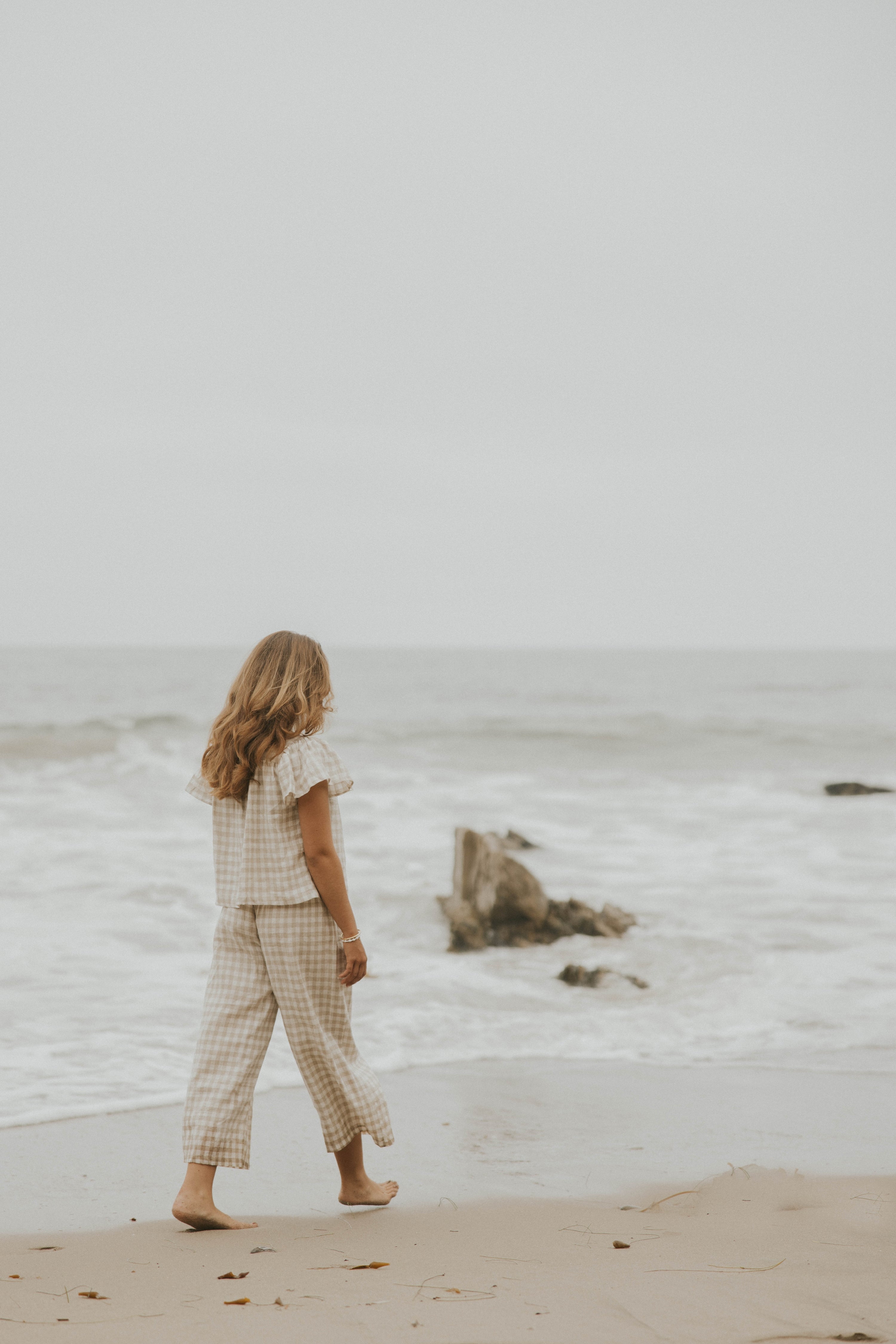 Matching loungewear set for women in a neutral checkered print.