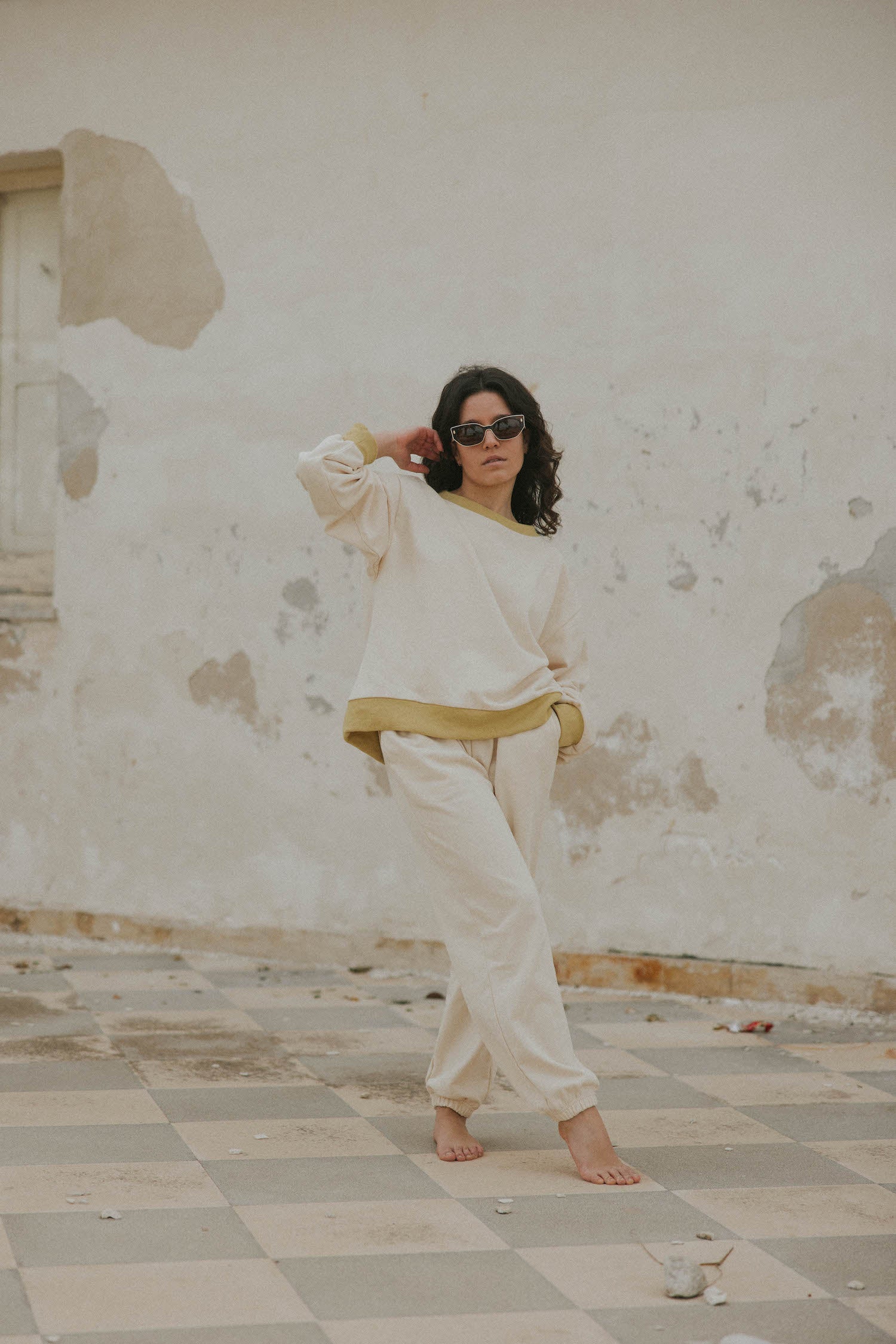 Matching neutral sweatsuit set for women.