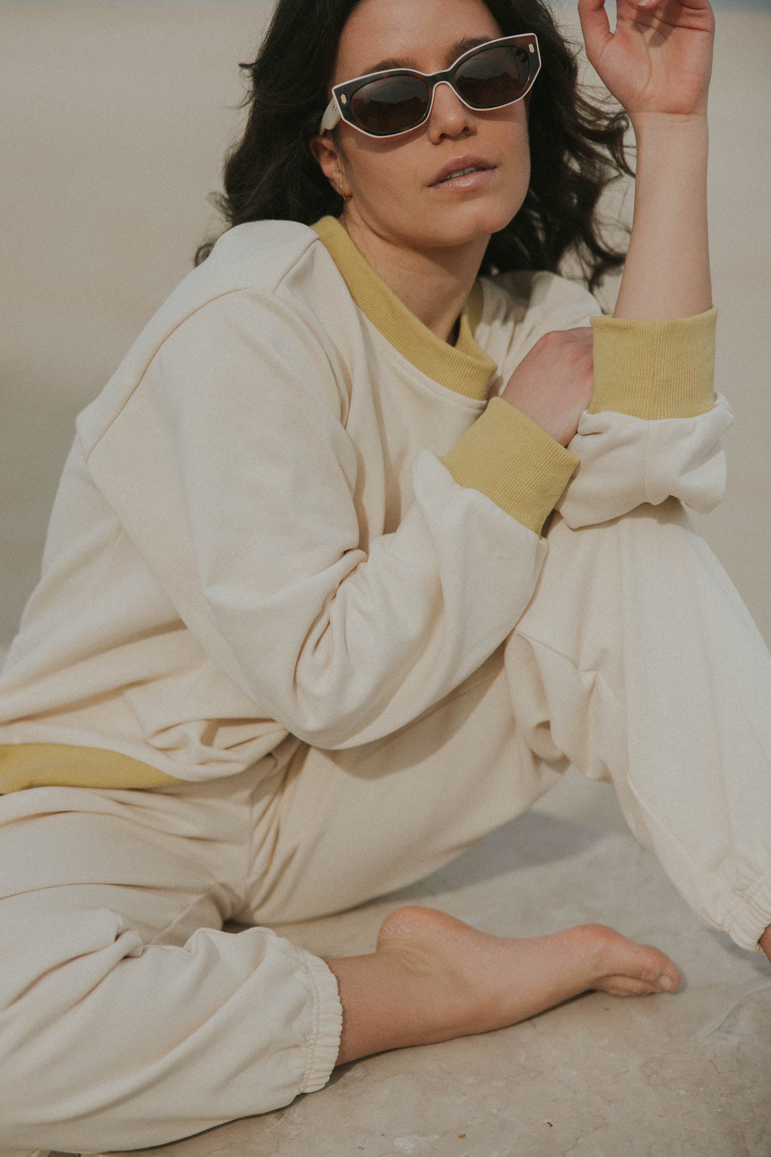 Matching neutral sweatsuit set for women.