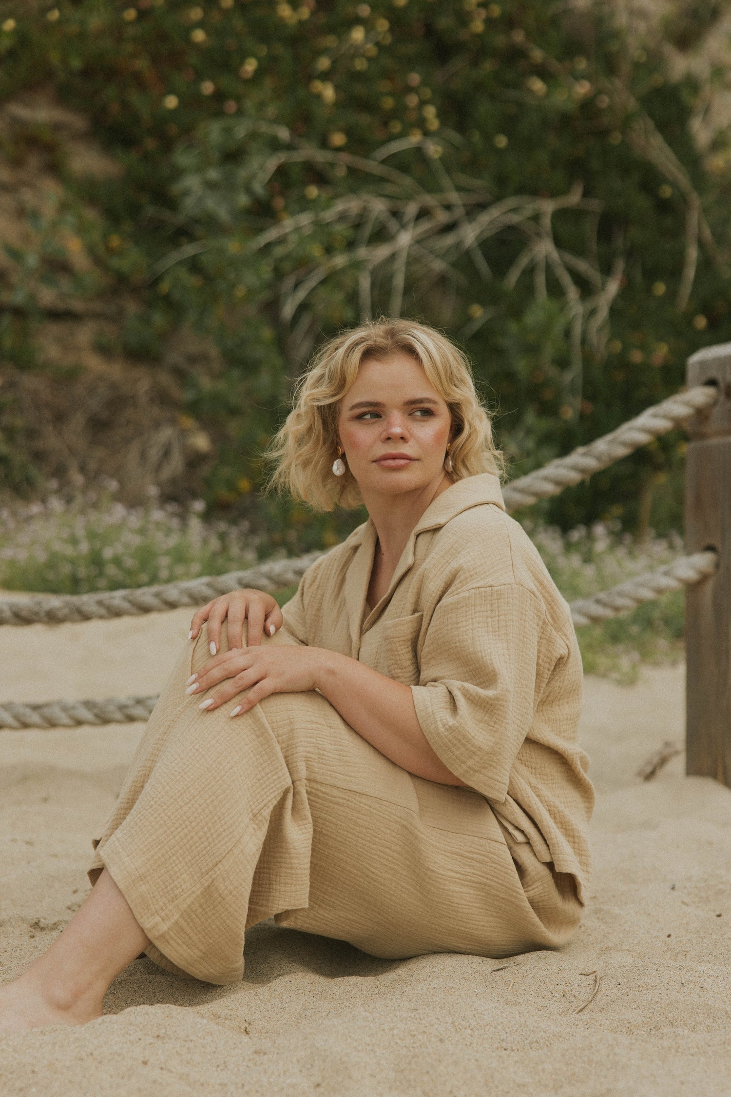 Brown muslin nursing-friendly top for women.