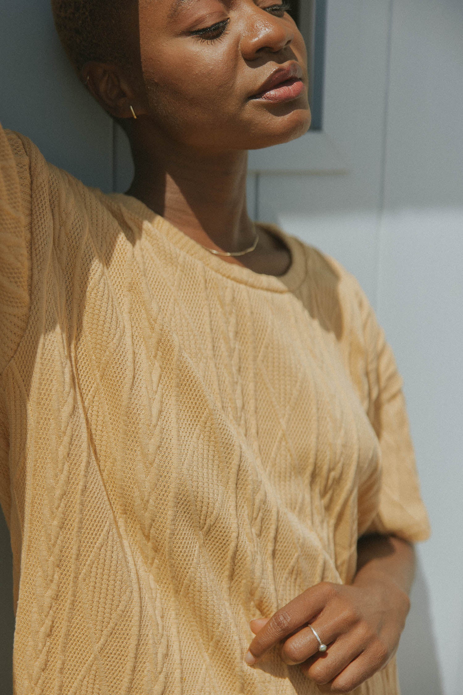 Cable knit sweater top for women.