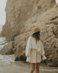 Muslin, cream matching beachwear set for women.