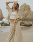 Brown muslin nursing-friendly top for women.