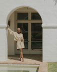 Mid-length muslin beach shorts for women in brown.