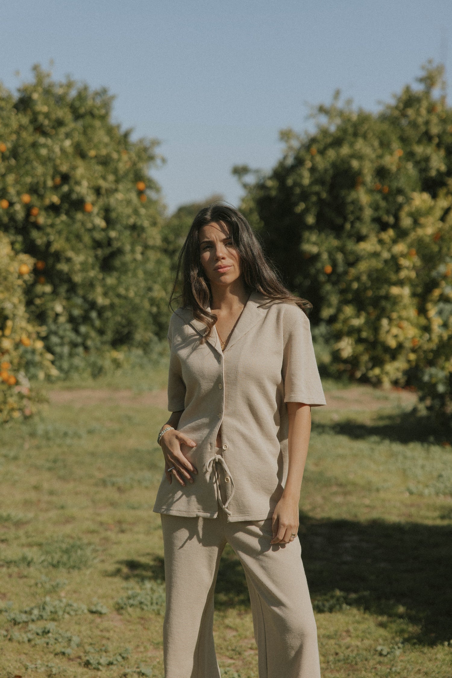 Women's neutral waffle knit shirt.