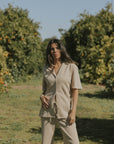 Women's neutral waffle knit shirt.