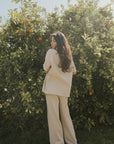Women's neutral waffle knit shirt.