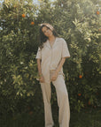 Women's neutral waffle knit shirt.