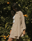 Striped matching shorts and top set for women.