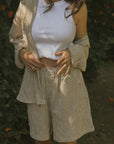 Striped matching shorts and top set for women.