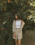 Striped matching shorts and top set for women.