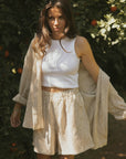 Striped matching shorts and top set for women.