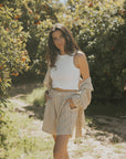 Striped matching shorts and top set for women.