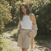 Striped matching shorts and top set for women.