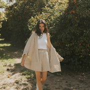 Striped matching shorts and top set for women.