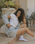 Striped matching shorts and top set for women.