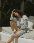 Striped matching shorts and top set for women.