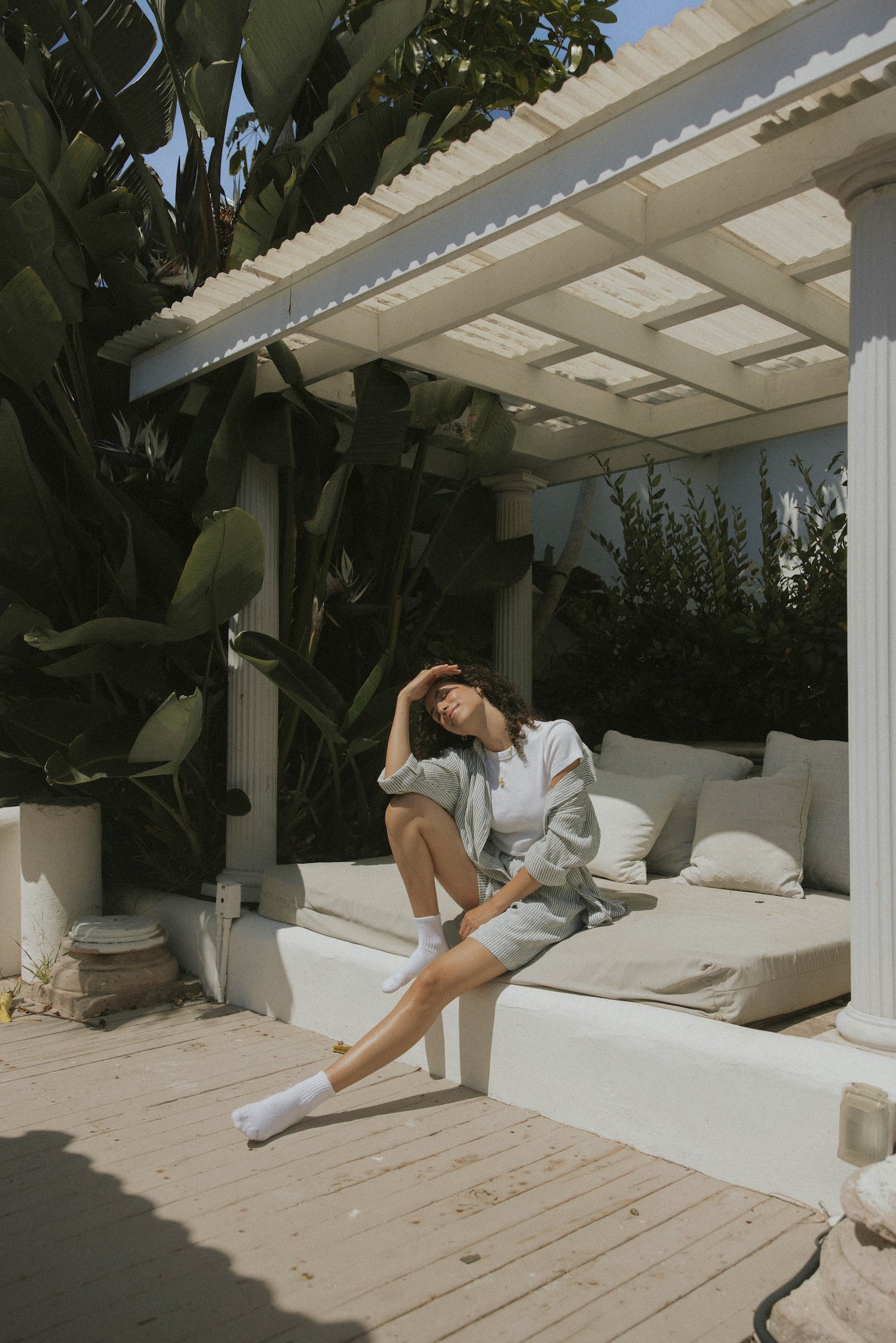 Striped matching shorts and top set for women.