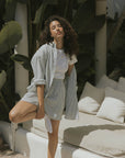 Striped matching shorts and top set for women.