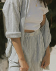 Striped matching shorts and top set for women.