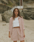 Striped matching shorts and top set for women.
