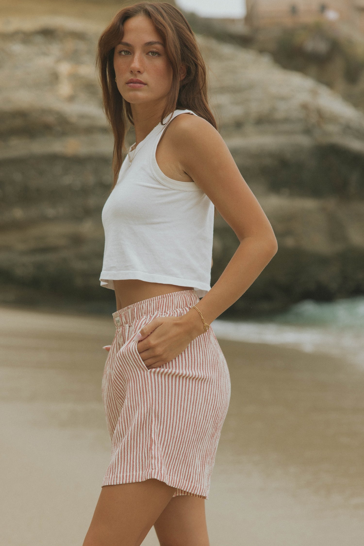 Striped matching shorts and top set for women.