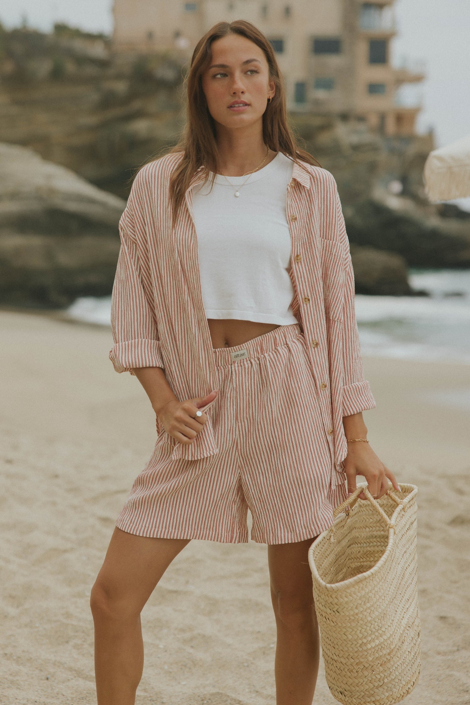 Striped matching shorts and top set for women.
