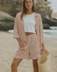 Striped matching shorts and top set for women.