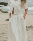 White two piece skirt set and linen two piece set.