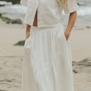 White two piece skirt set and linen two piece set.