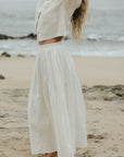 White two piece skirt set and linen two piece set.