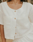 White two piece skirt set and linen two piece set.