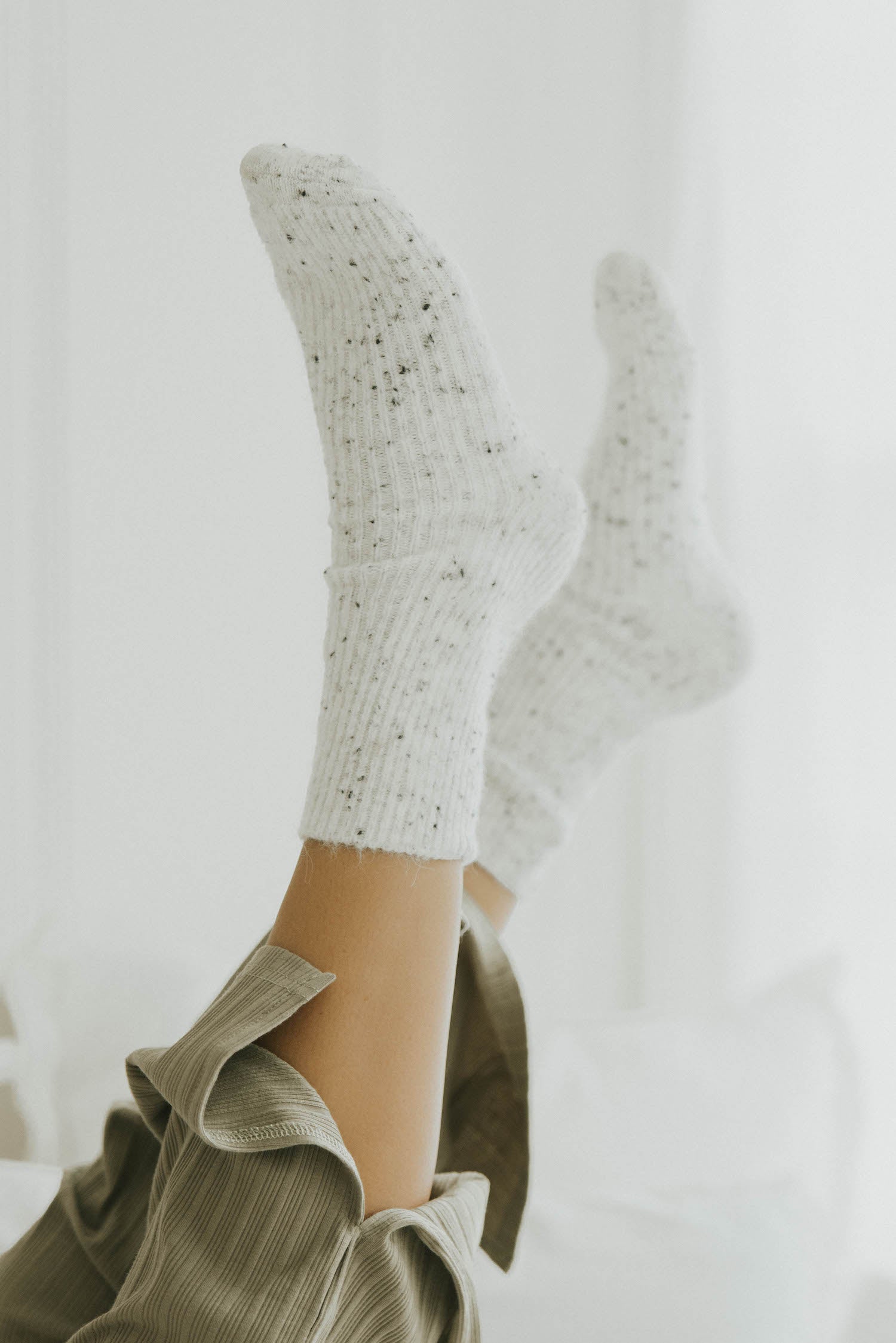 Speckled neutral wool socks with matching sets for women.
