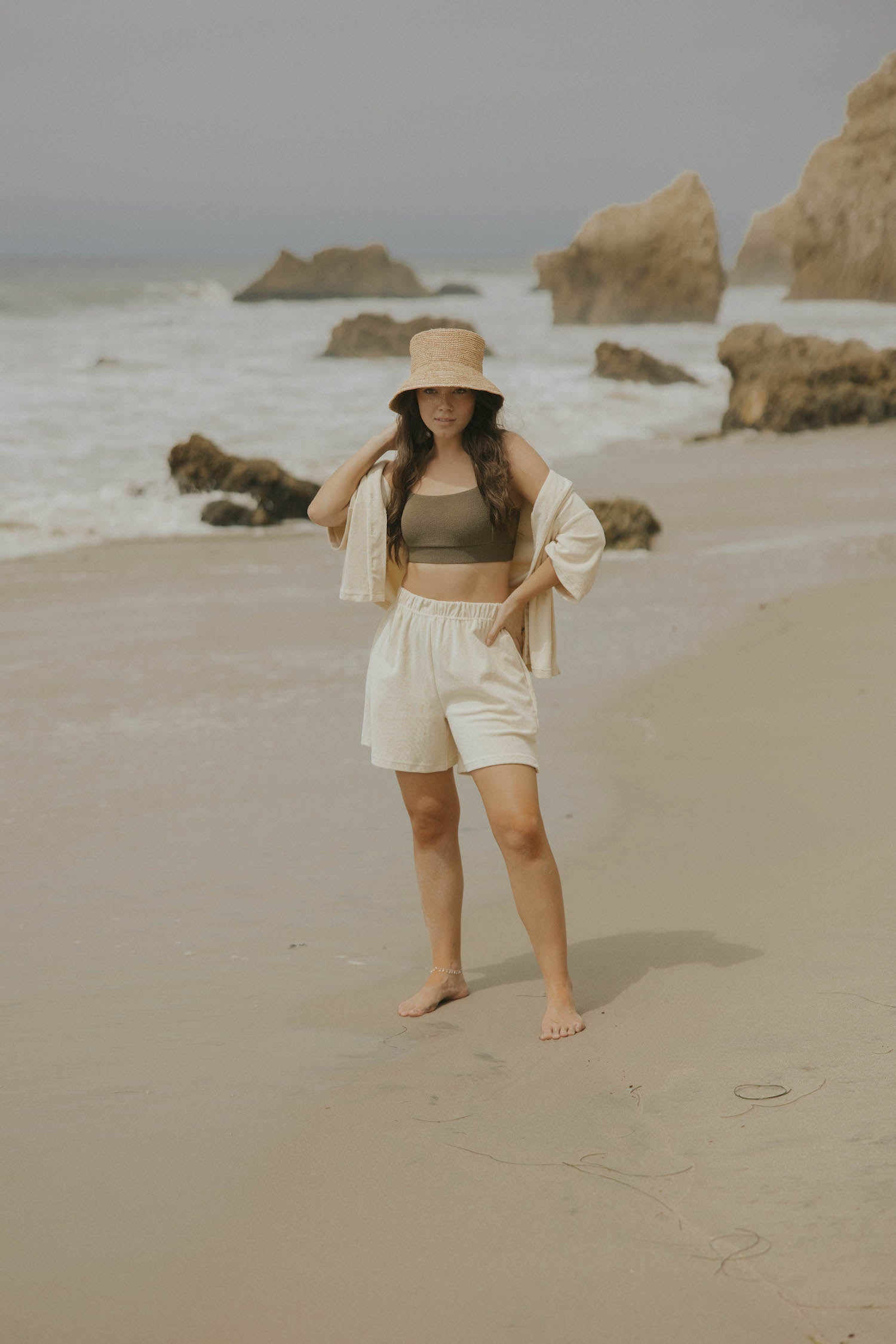 Neutral matching beachwear set for women.