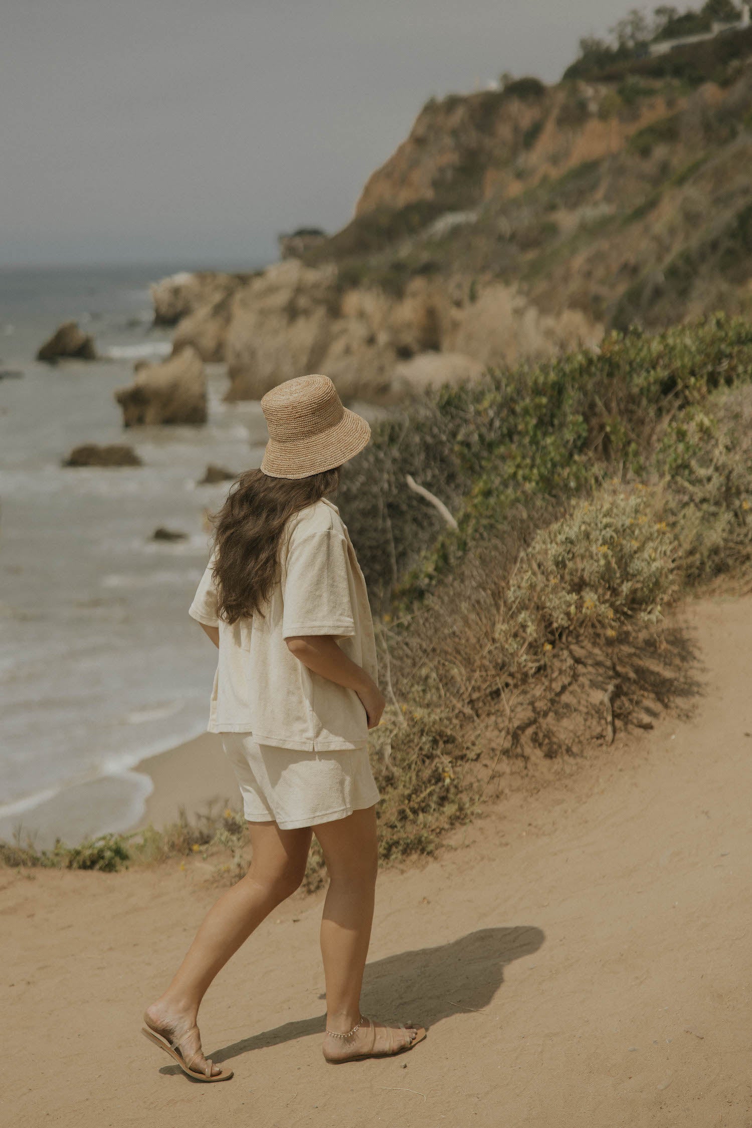 Neutral matching beachwear set for women.