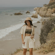 Neutral matching beachwear set for women.