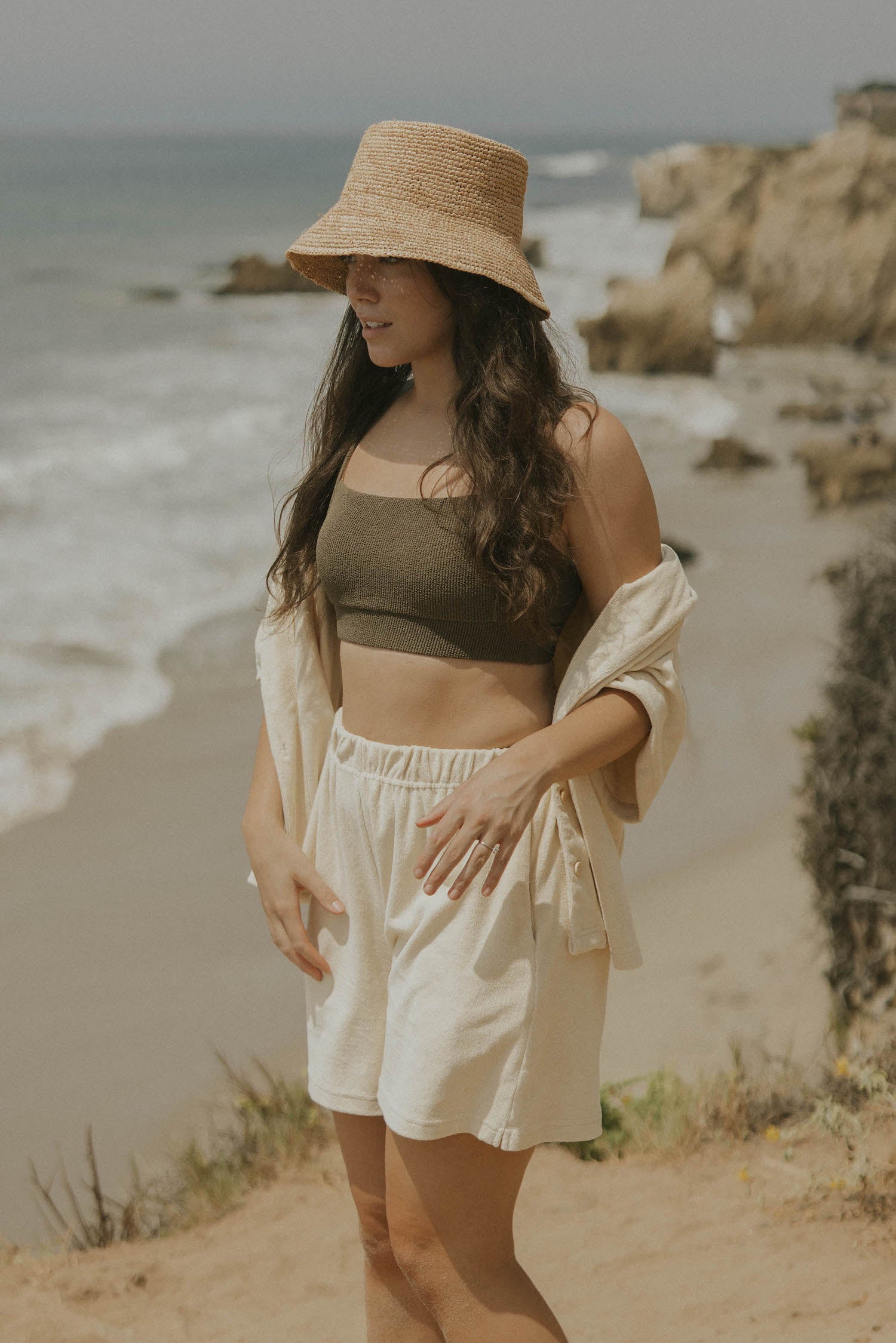 Neutral matching beachwear set for women.
