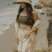 Neutral matching beachwear set for women.