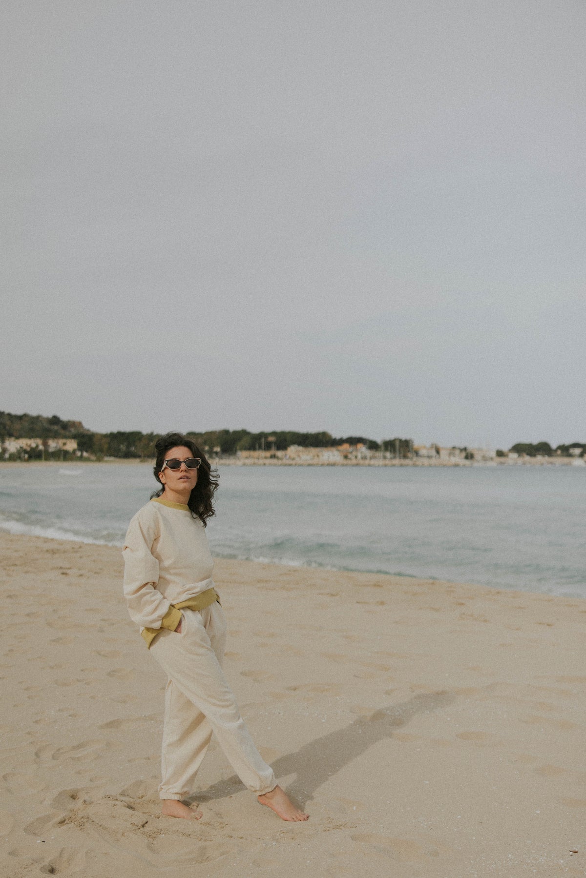 Matching neutral sweatsuit set for women.