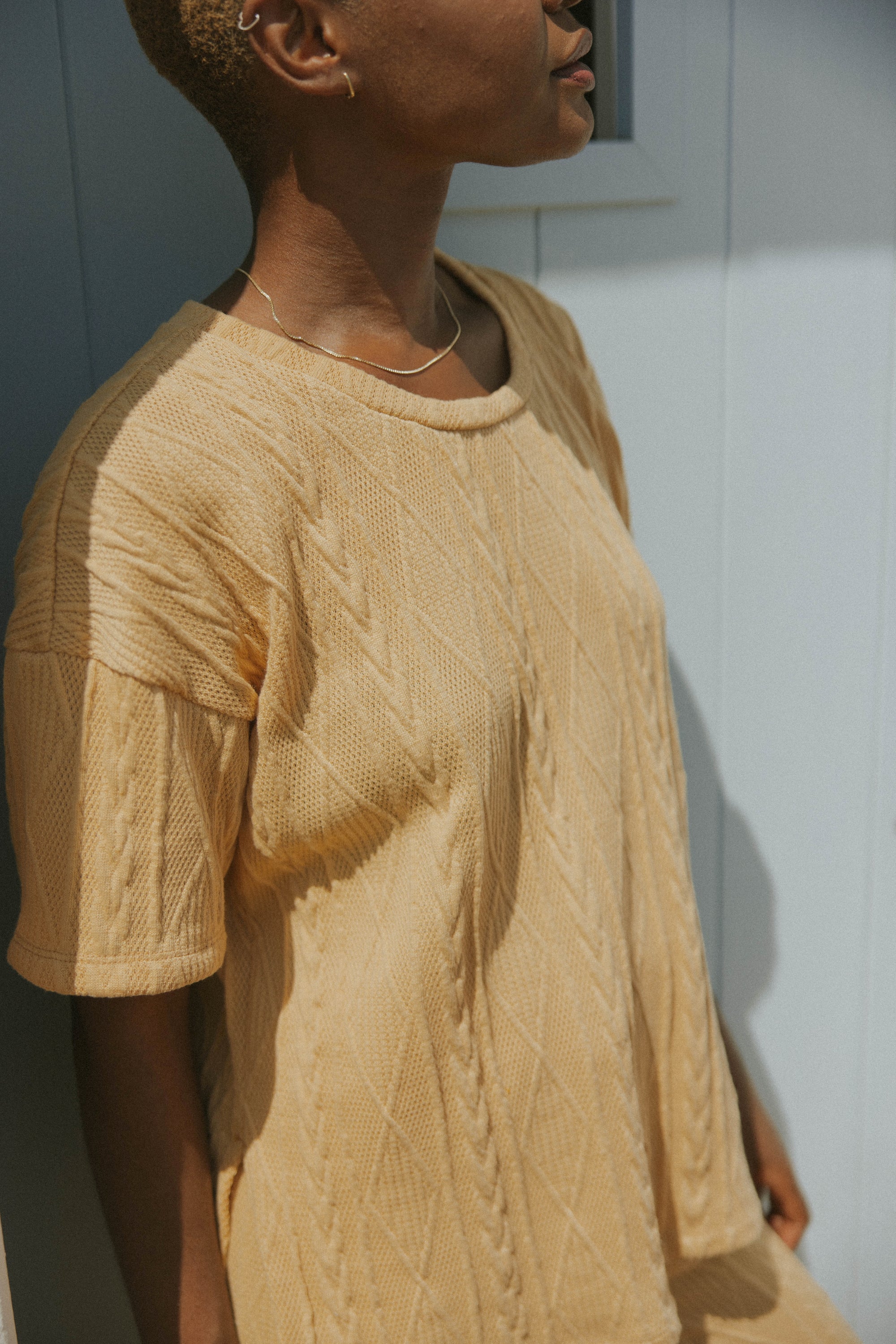 Women's loungewear set in yellow, sweater material.