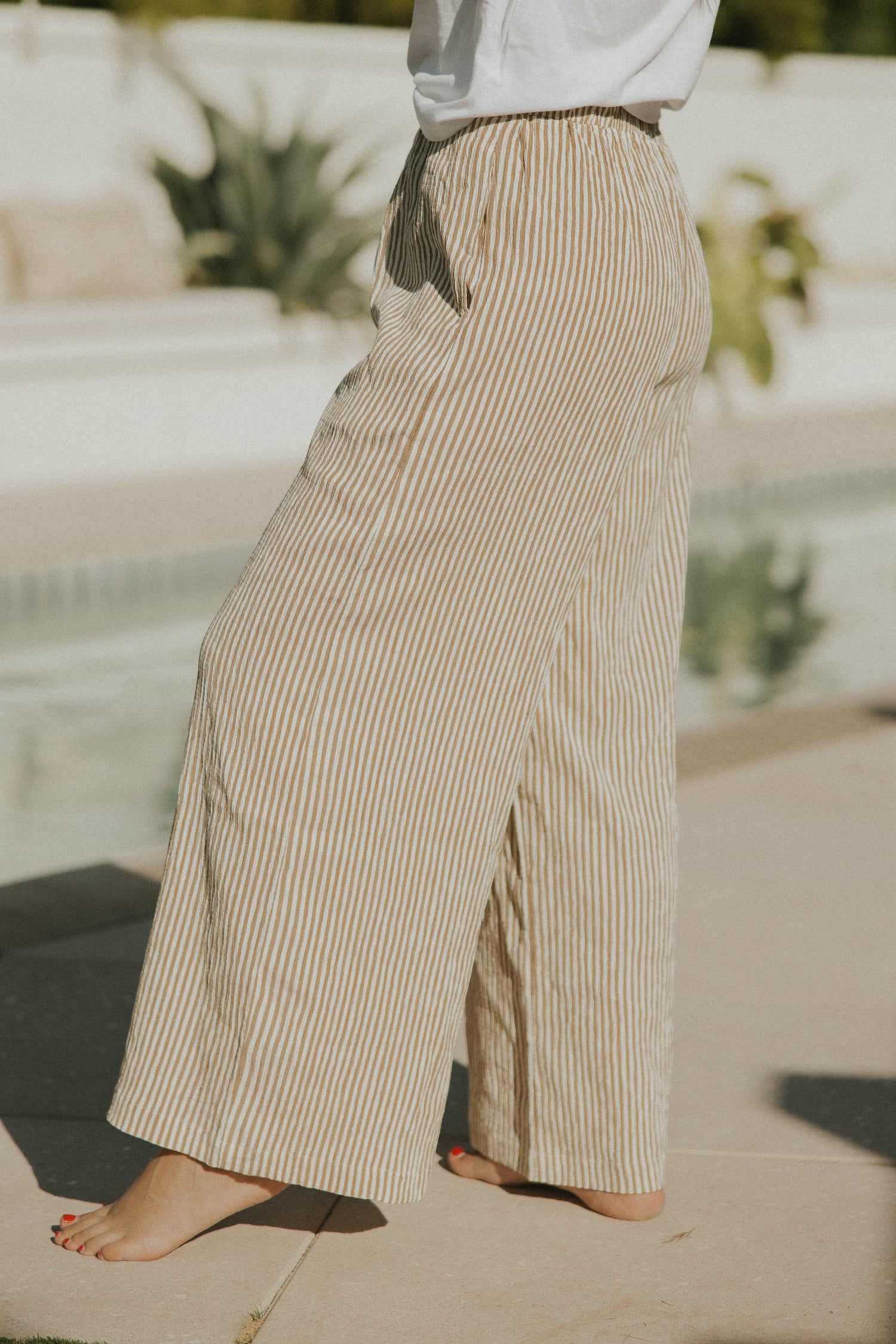 Neutral striped lounge pants for women.