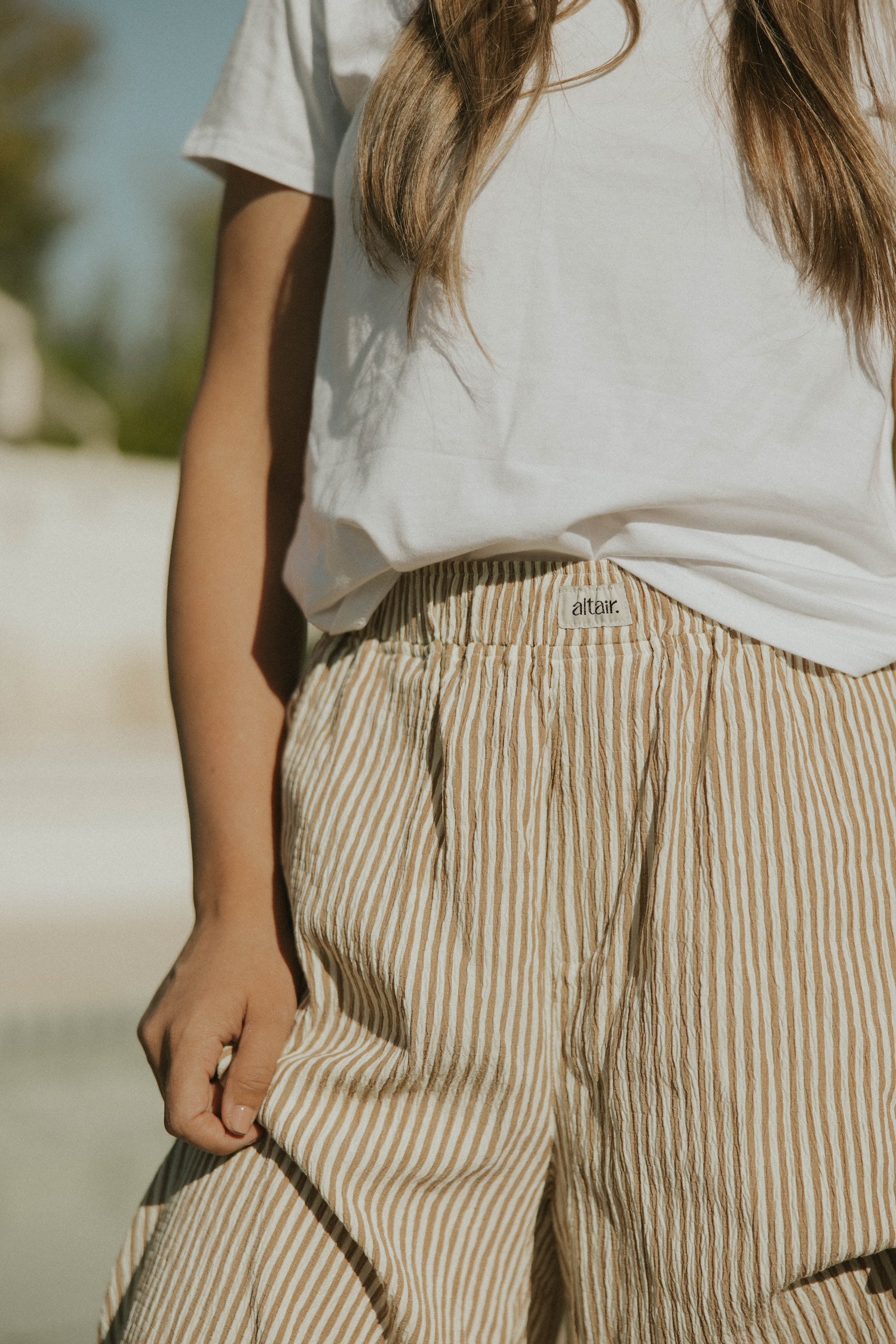 Striped matching top and pants set for women.