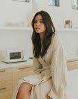 Cotton waffle knit robe in cream.