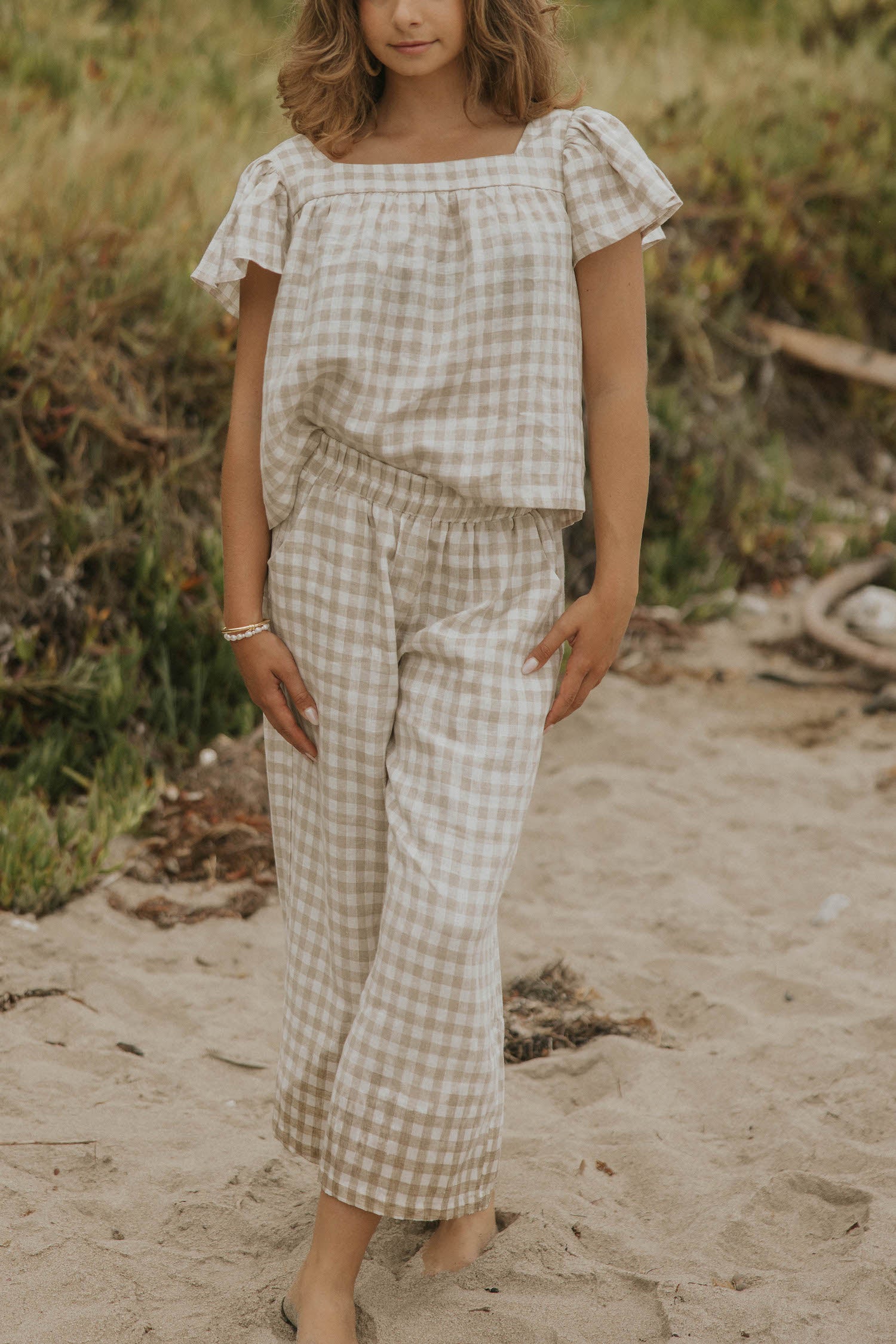 Matching loungewear set for women in a neutral checkered print.