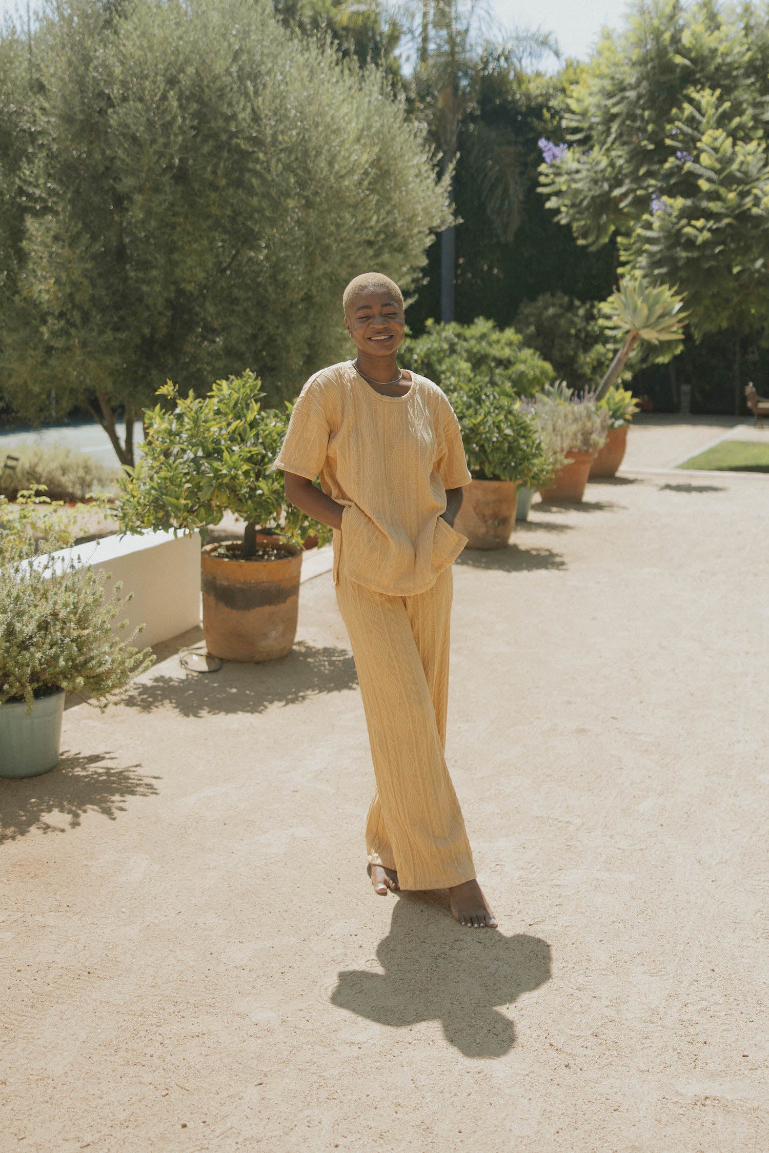 Cable-knit lounge pants for women in yellow.