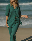 Women's green waffle knit shirt.
