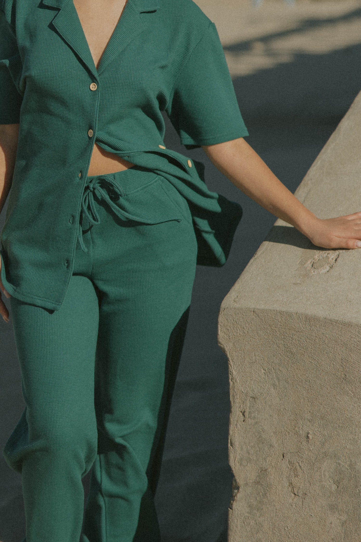 Women&#39;s waffle knit lounge pants in jade green. 