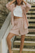 Striped matching shorts and top set for women.