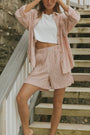 Striped matching shorts and top set for women.