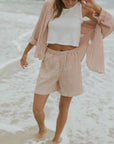Striped matching shorts and top set for women.
